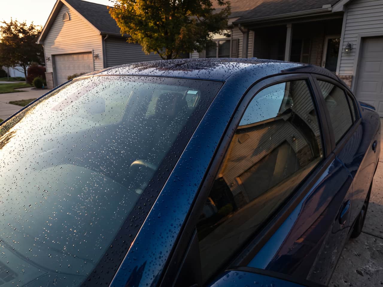 Tight water beads standing on a windscreen after glass polishing and a coating